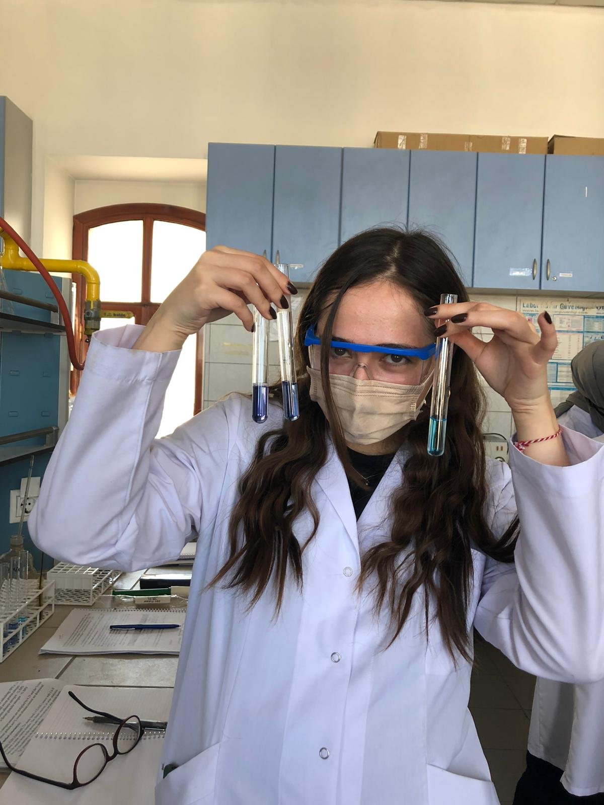Melike in the pharmacy lab during her university years in Turkey